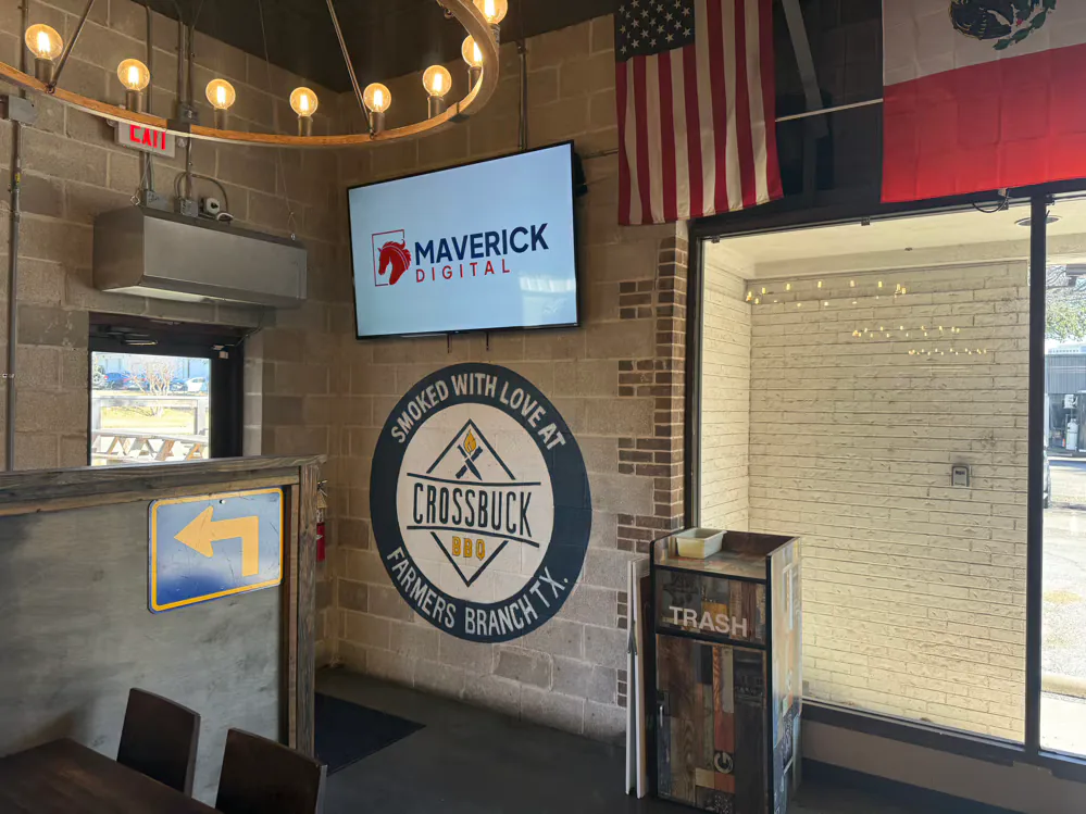 Maverick Digital indoor advertising screen at Crossbuck BBQ in Farmers Branch, TX